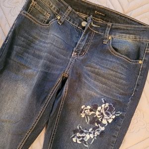 Flower embroidered skinny jeans size 6